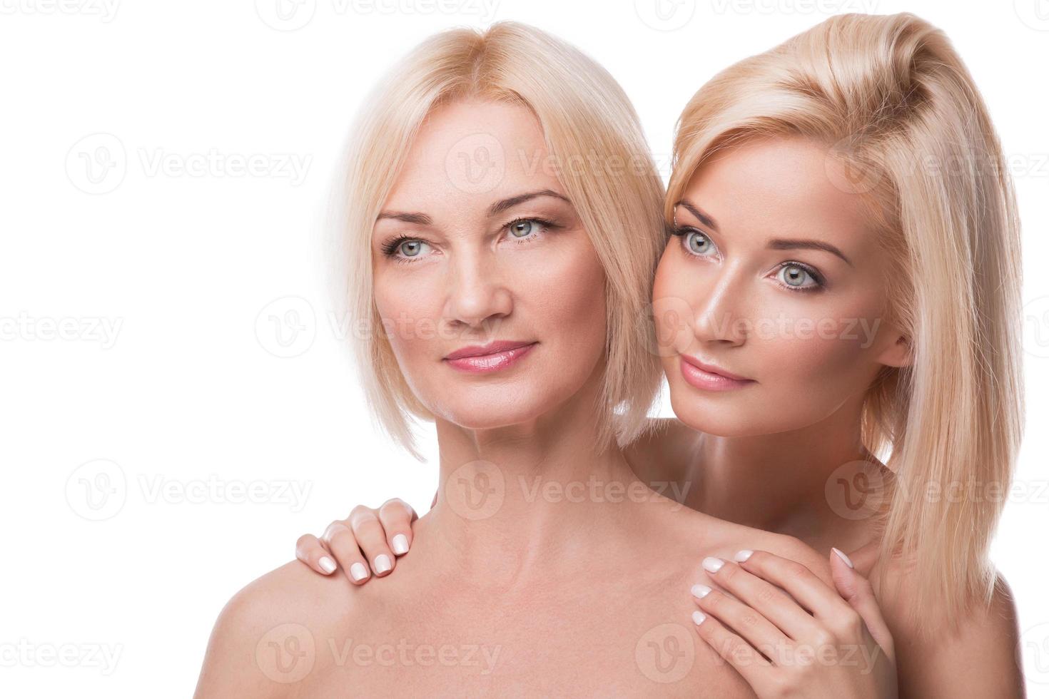 Beautiful middle aged mother and her adult daughter photo