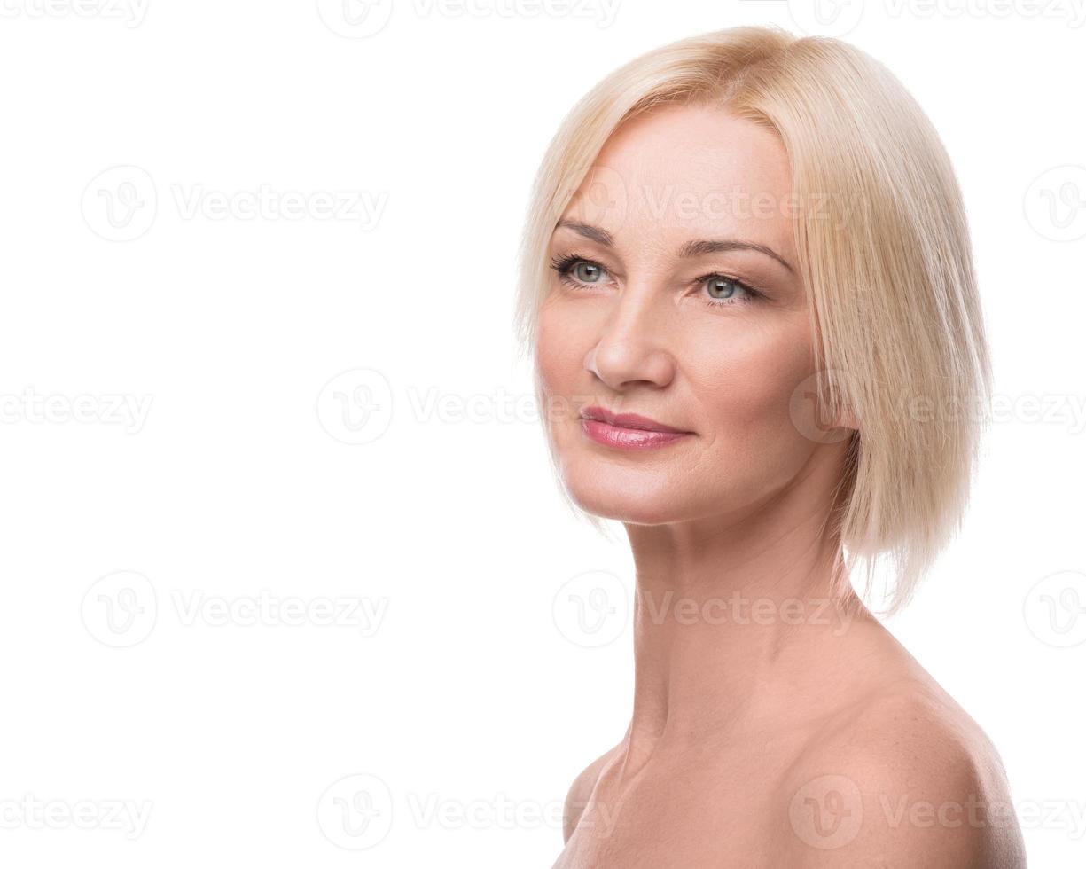 Portrait of beautiful middle aged woman on white background photo