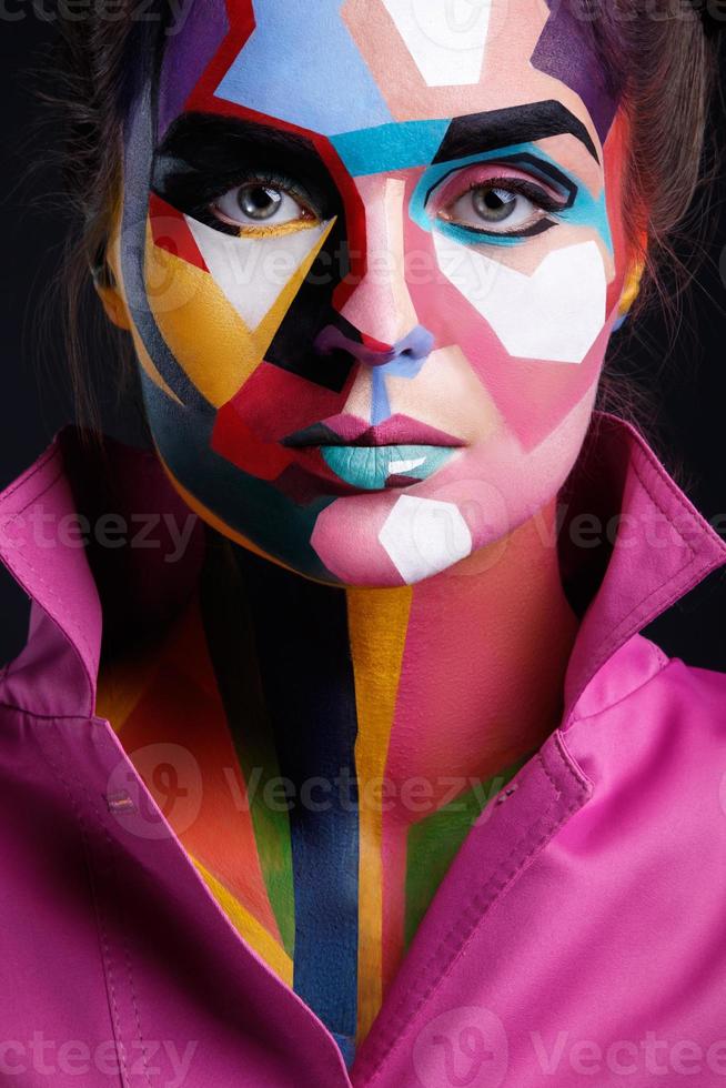 Model with a pop art makeup on her face photo