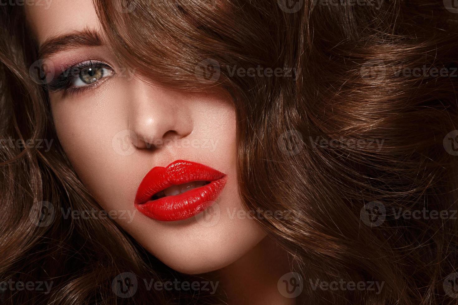 Portrait of beautiful woman with red lips photo