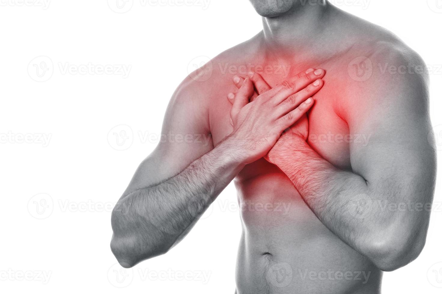 Young man with pain in his chest photo