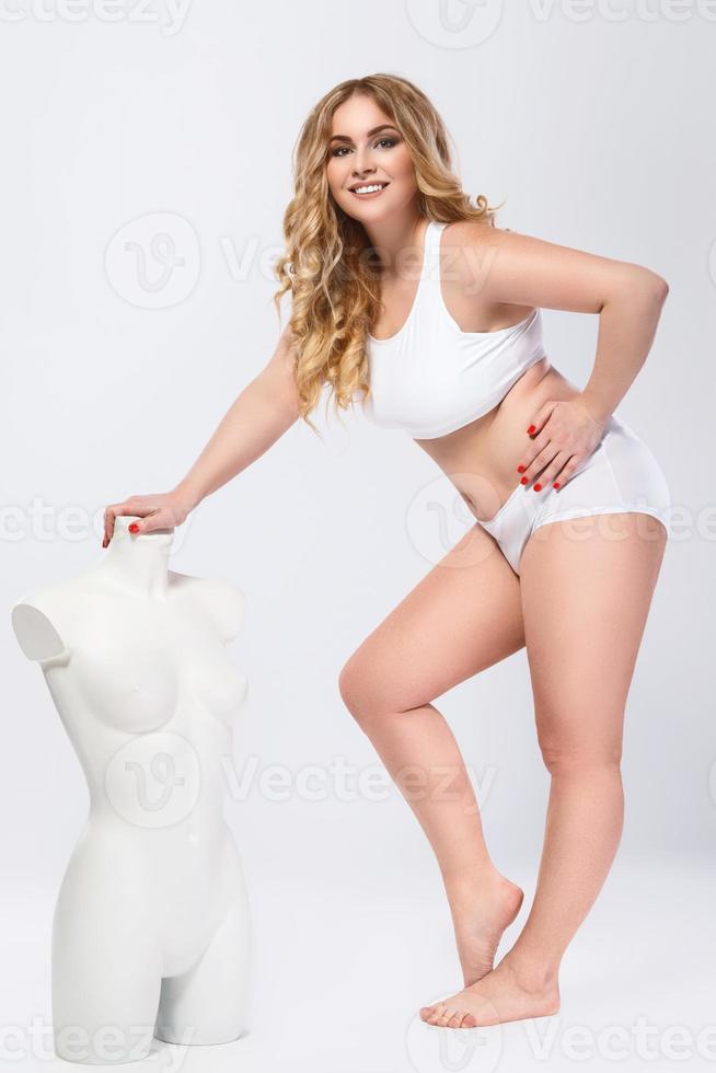 Plus size model and dummy female torso photo