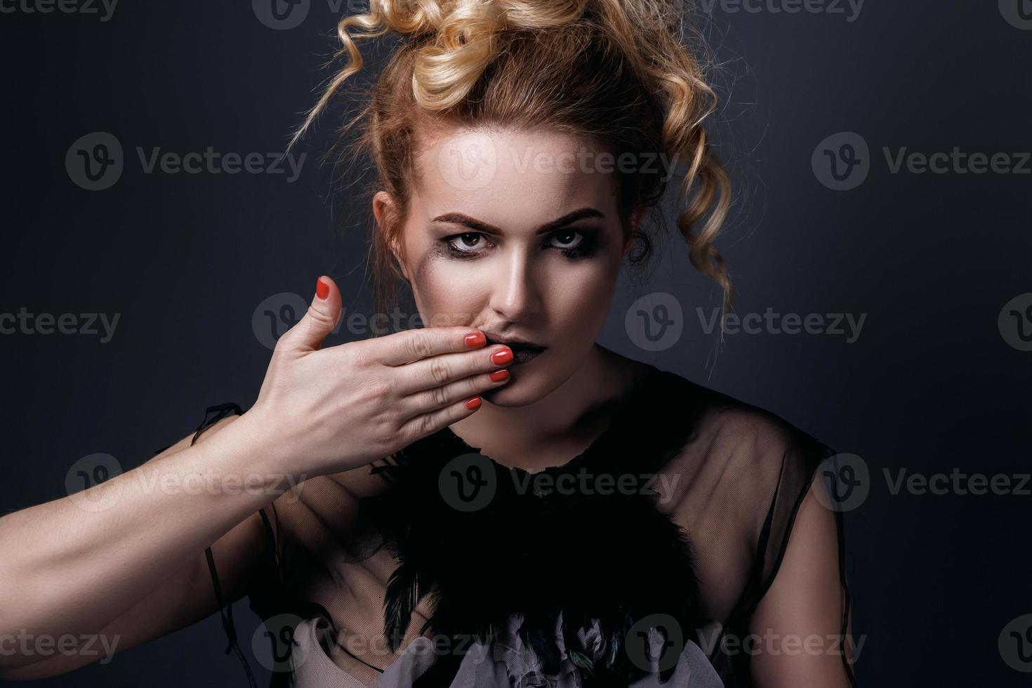 Portrait of plus size model with smeared make-up photo