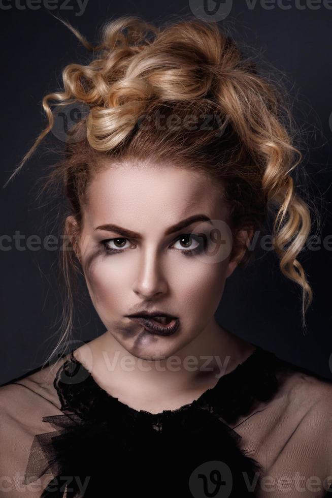 Portrait of plus size model with smeared make-up photo