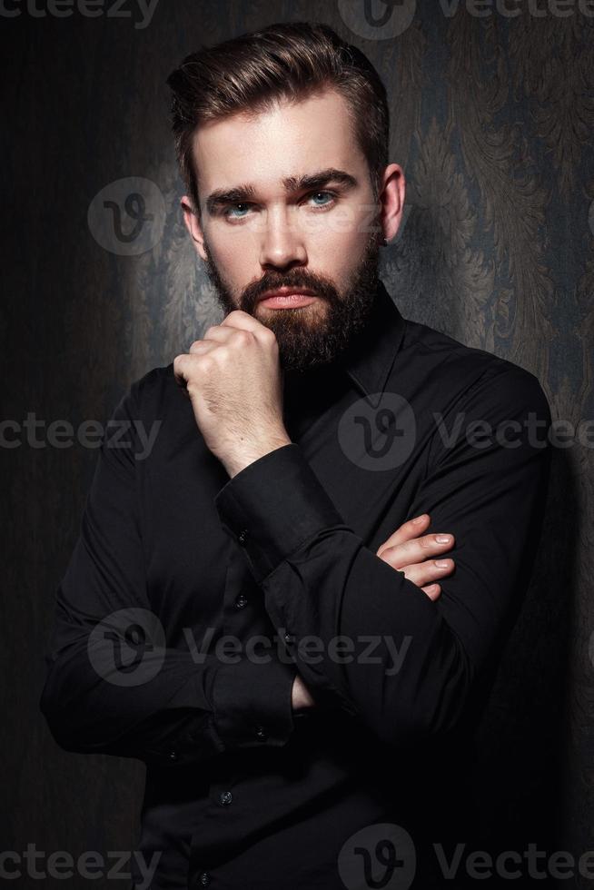 Portrait of stylish handsome man with a beard photo