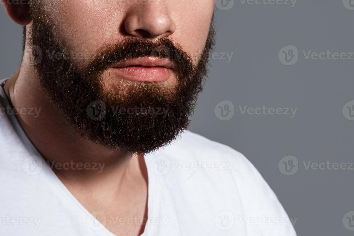 Closeup of male thick beard in studio photo