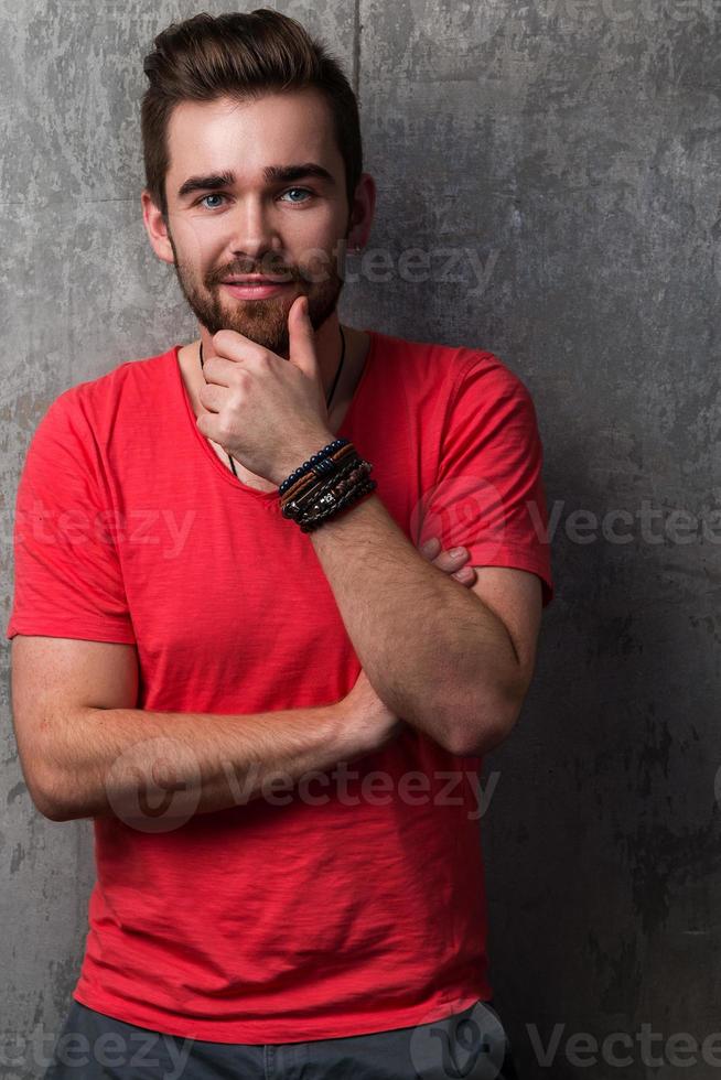 Handsome guy with beard and stylish haircut photo