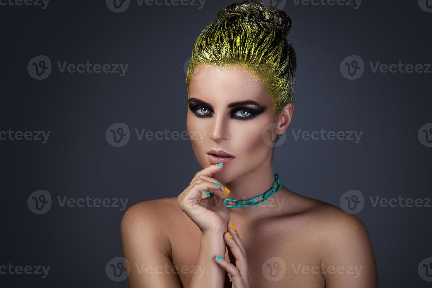 Portrait of stylish girl with a yellow hair photo