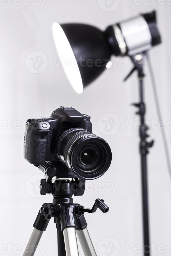 DSLR camera on tripod photo