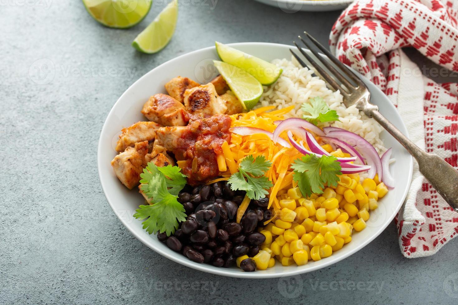 Mexican burrito bowl with salsa chicken and beans photo