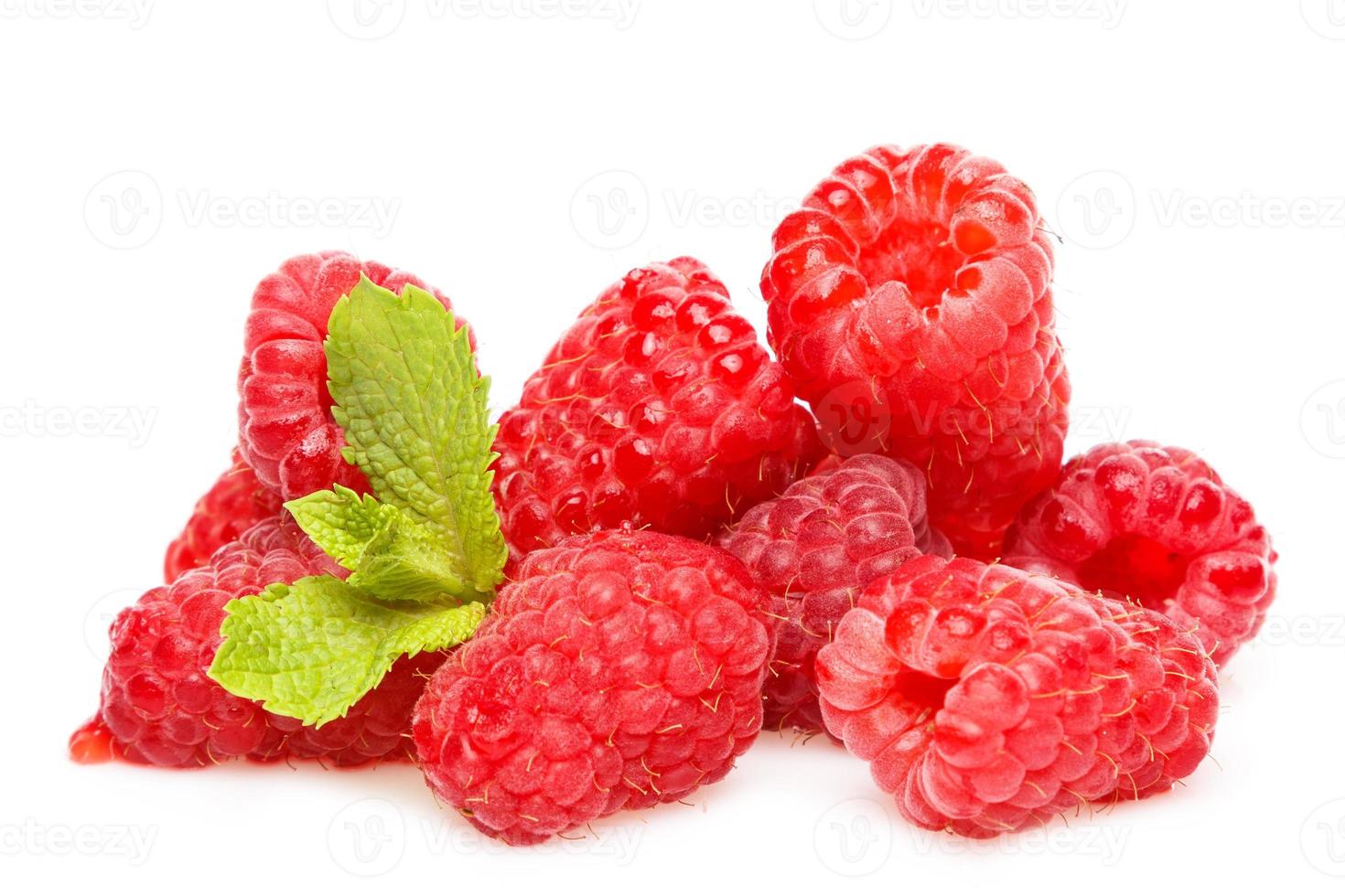 Fresh red ripe raspberries on white background photo