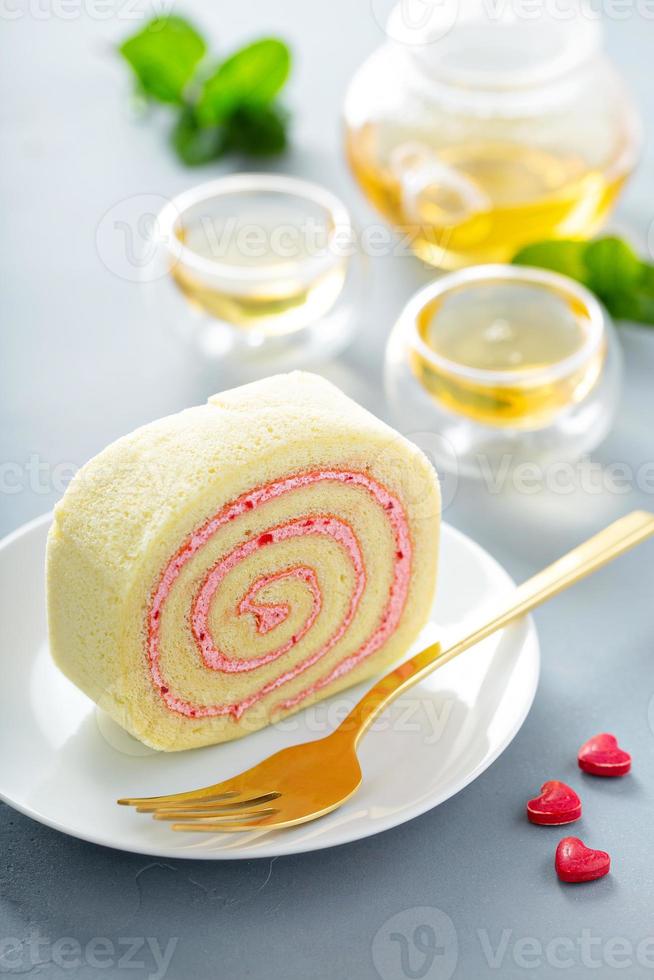 Cake roll with pink filling photo