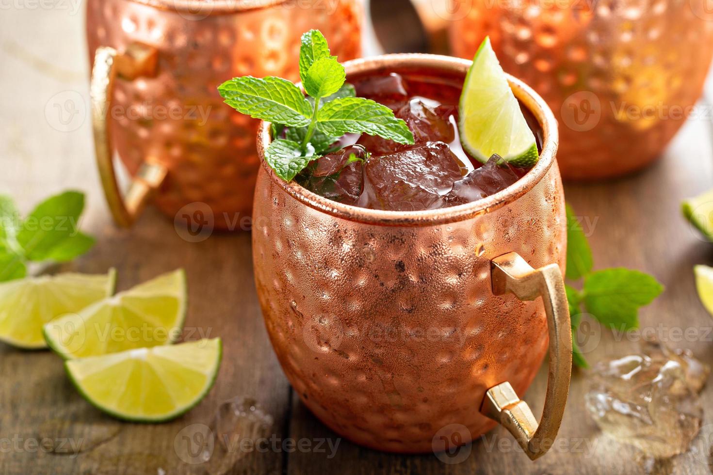 Traditional Moscow Mule in classic copper mugs photo