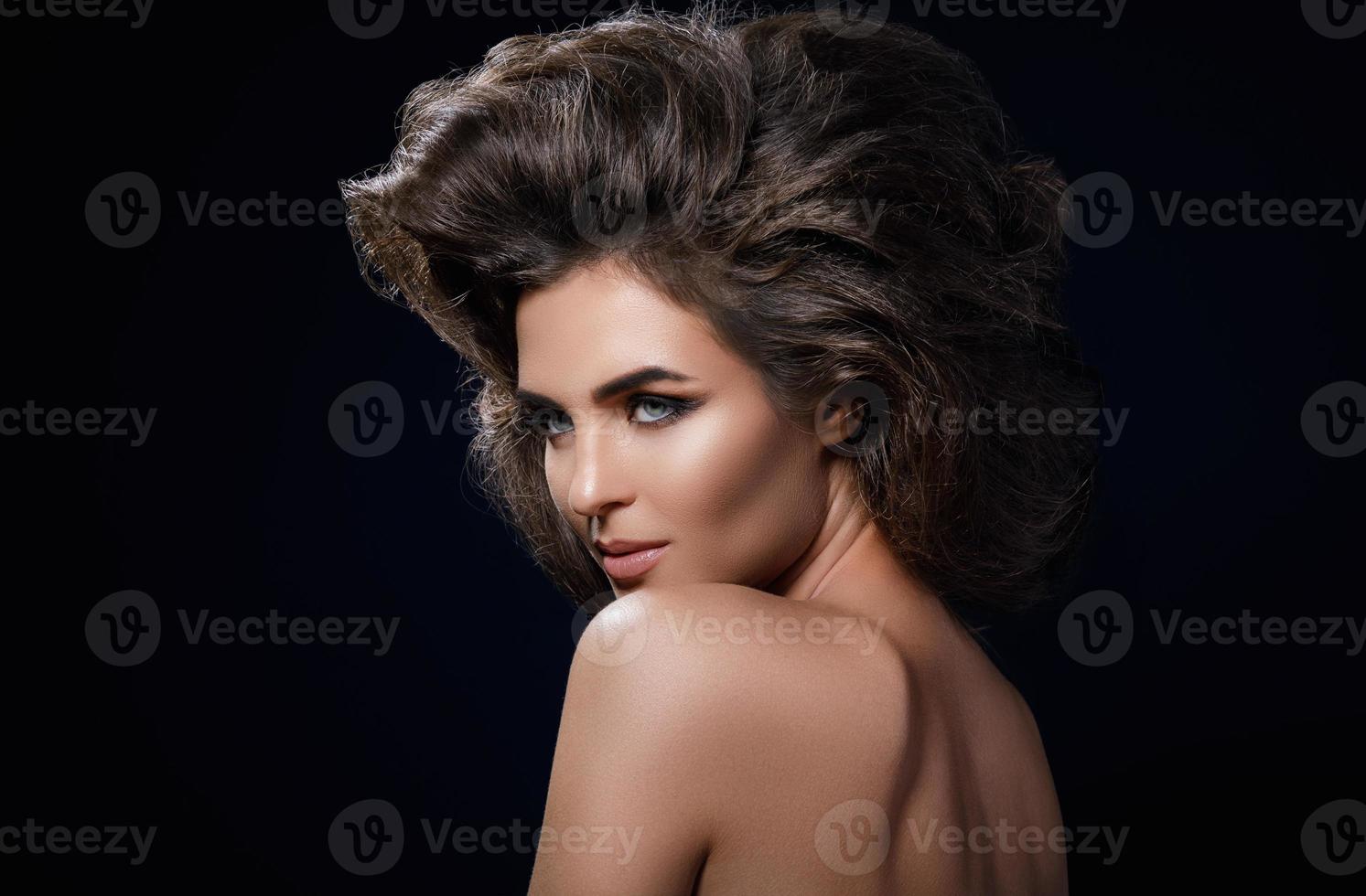 Gorgeous woman with a beautiful hairstyle and make-up photo