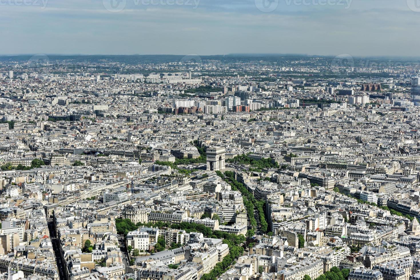 Aerial view of the Arc de Triomph in Paris, France in the summer. photo
