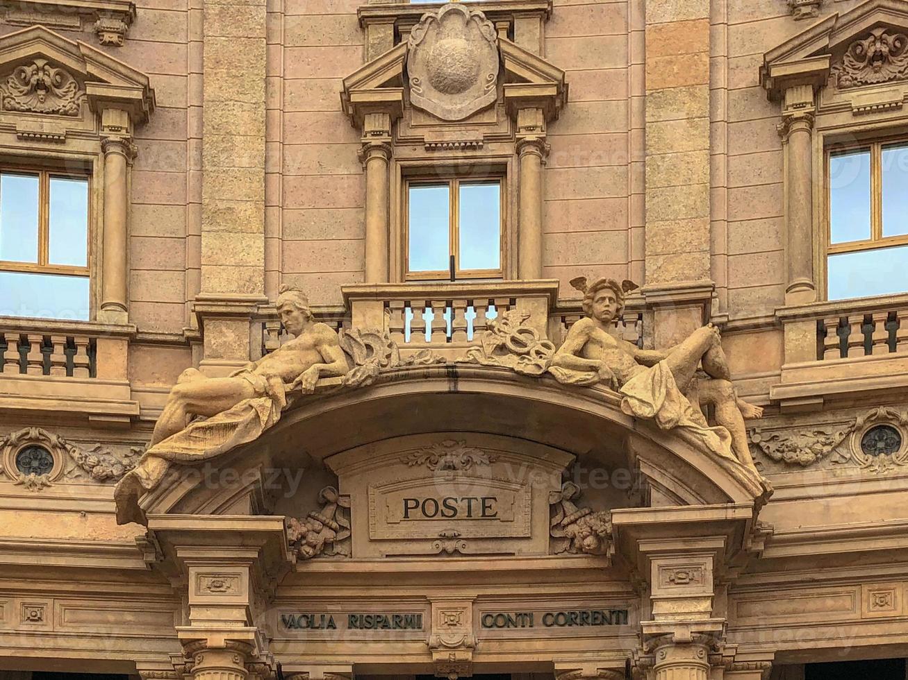 Cordusio square post office detail front entrance ornaments. It was the old stock exchange of Milan, Italy in the past. photo
