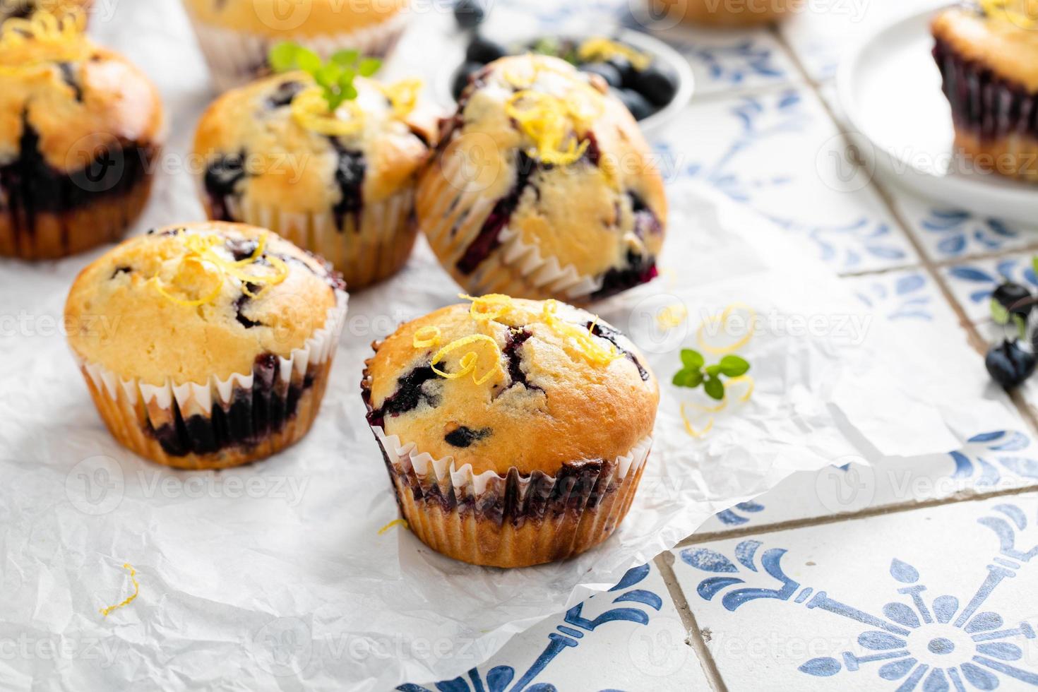 Blueberry muffins with fresh berries and preserves photo