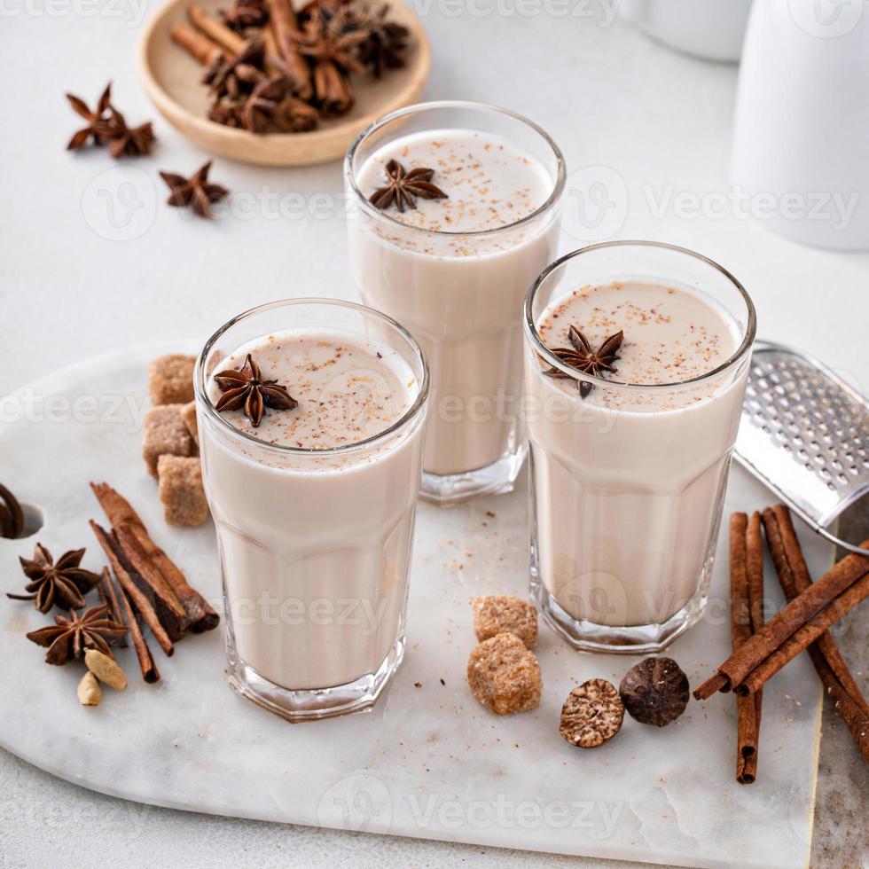 Chai in tall glasses with whole spices photo