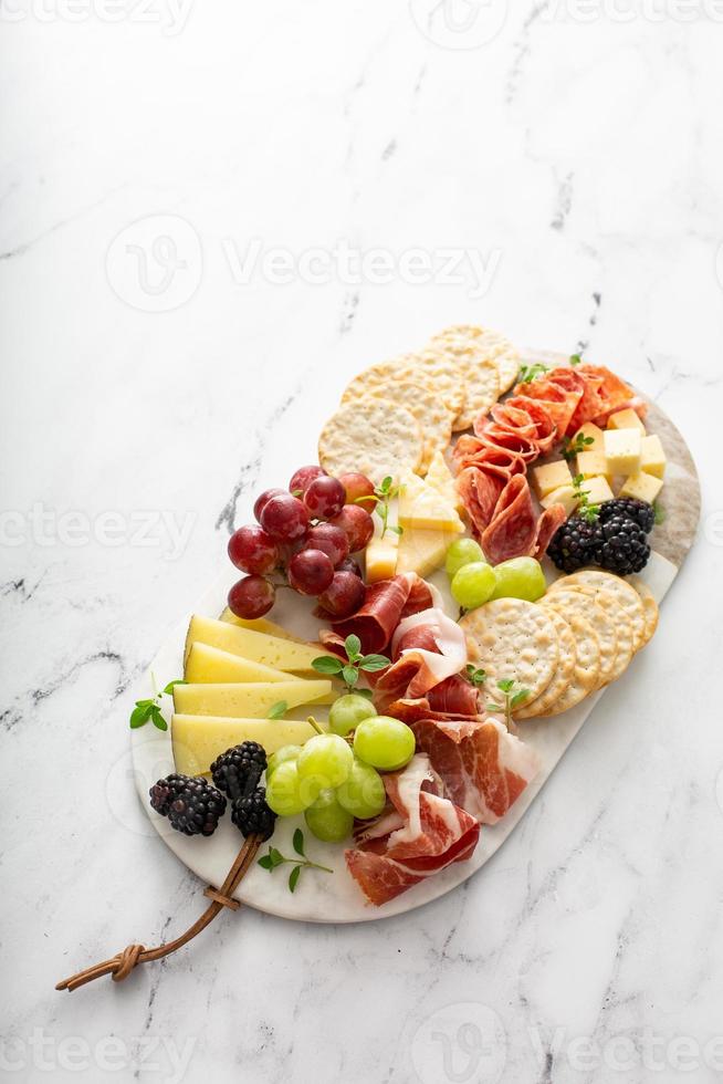 Summer charcuterie board with cheese, meat and fruit 16116670 Stock