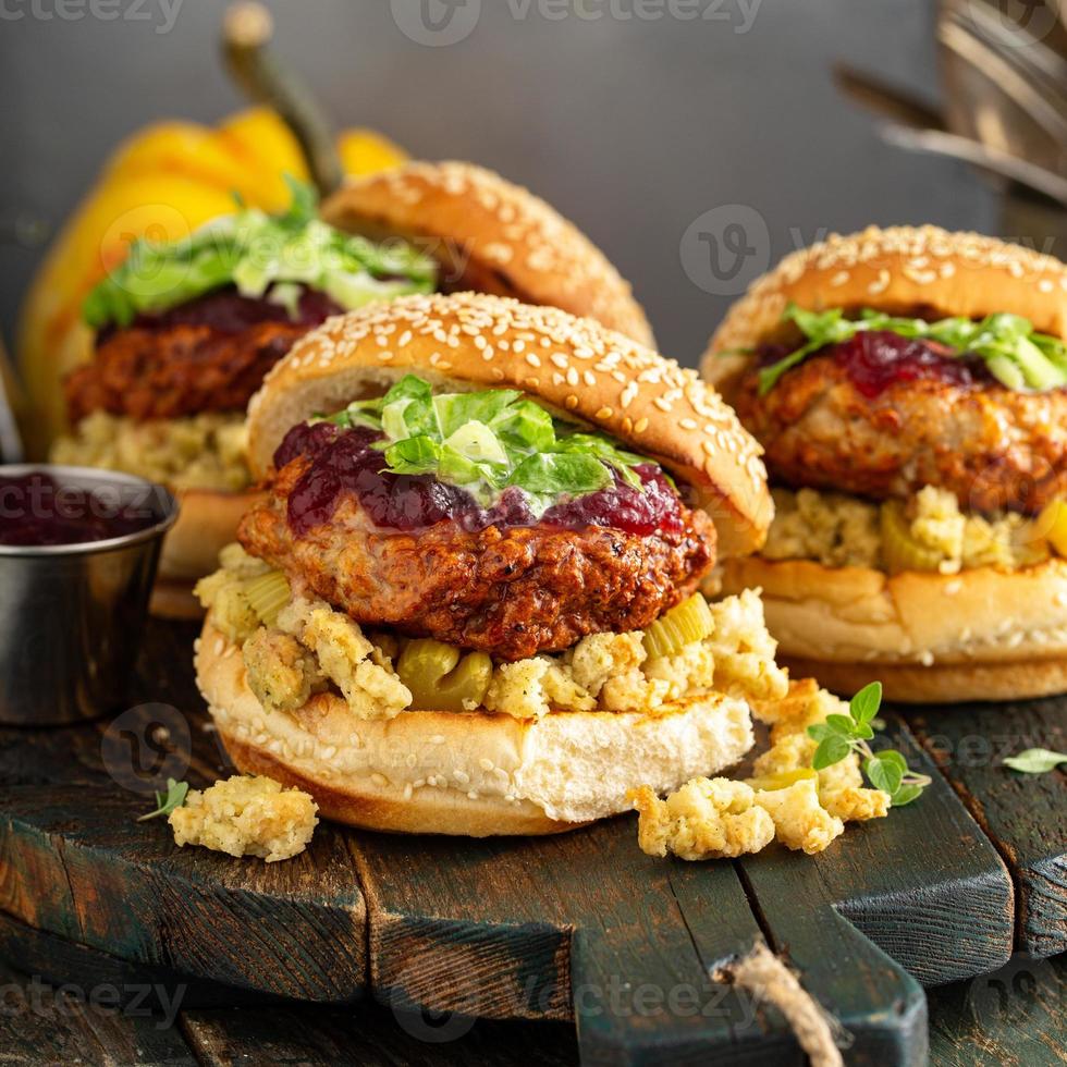 Turkey burgers with stuffing and cranberry sauce photo