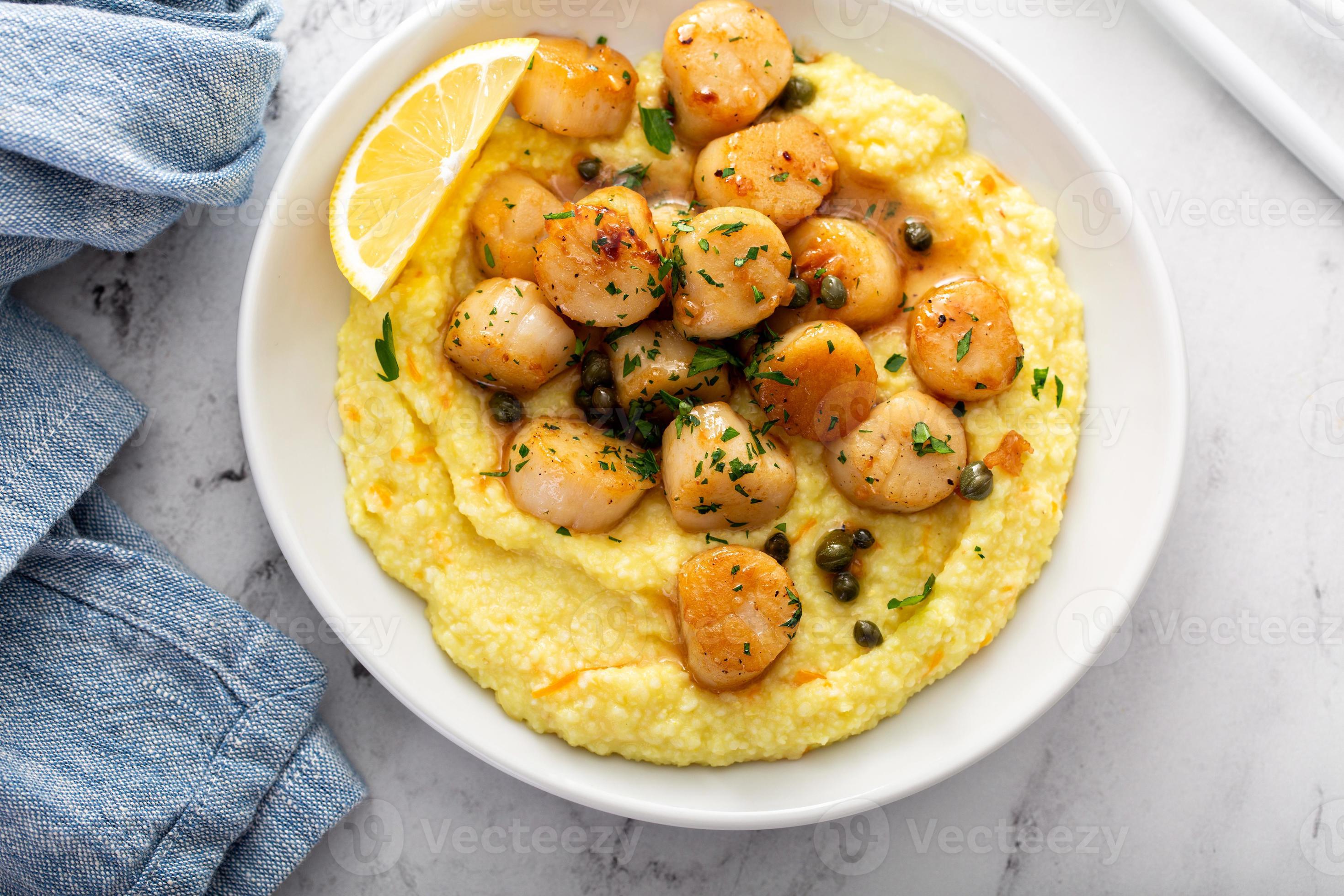 Seared scallops with grits 16116881 Stock Photo at Vecteezy