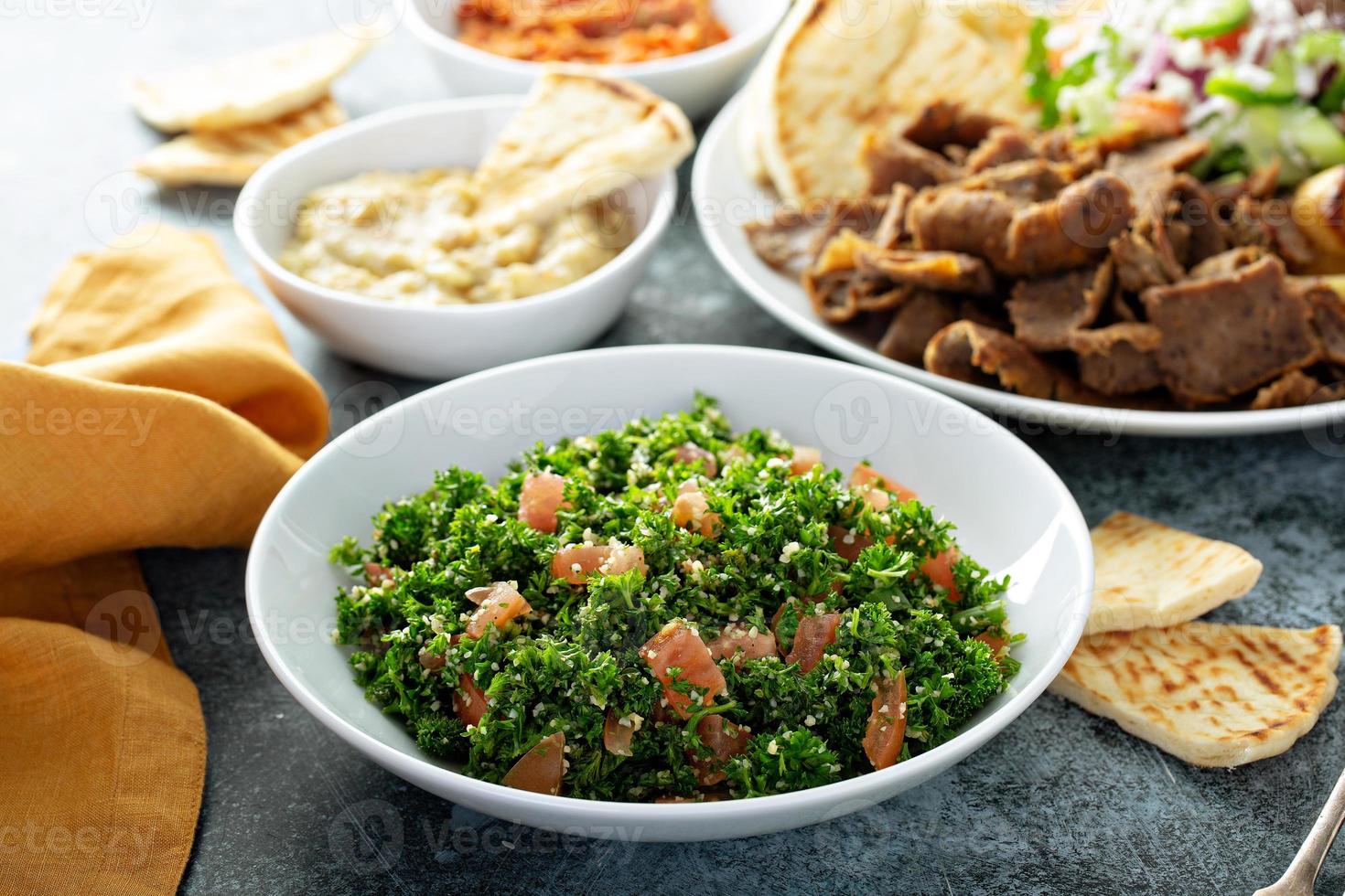 Parsley tabbouleh with tomato and cous cous photo