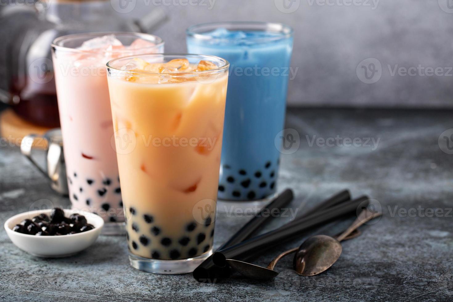 Variety of milk bubble tea in tall glasses photo