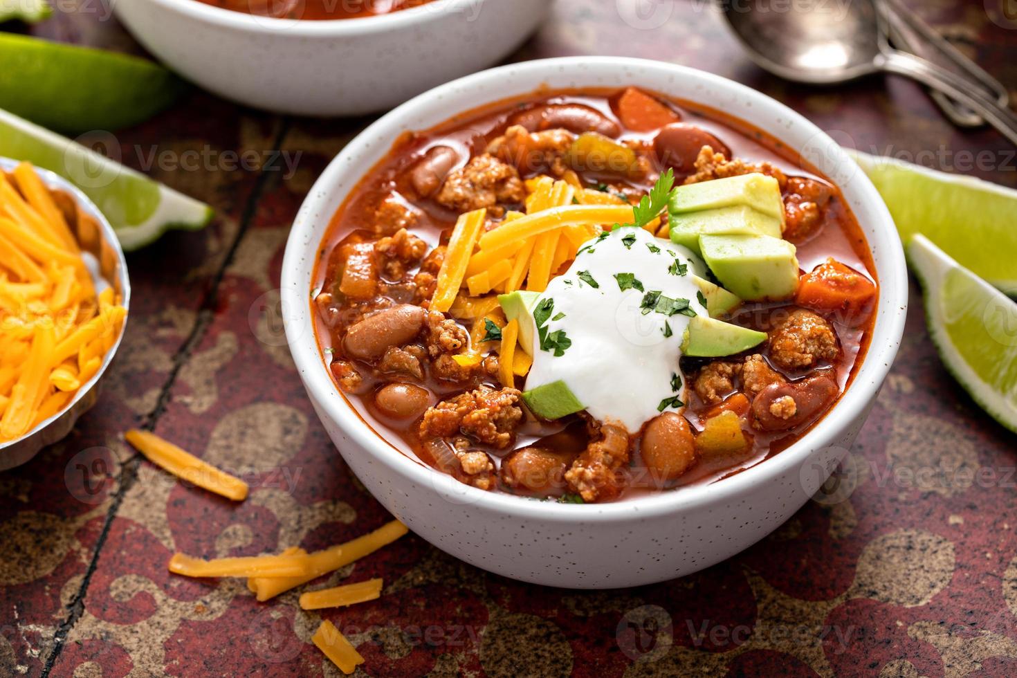 Traditional chili soup with meat and red beans photo