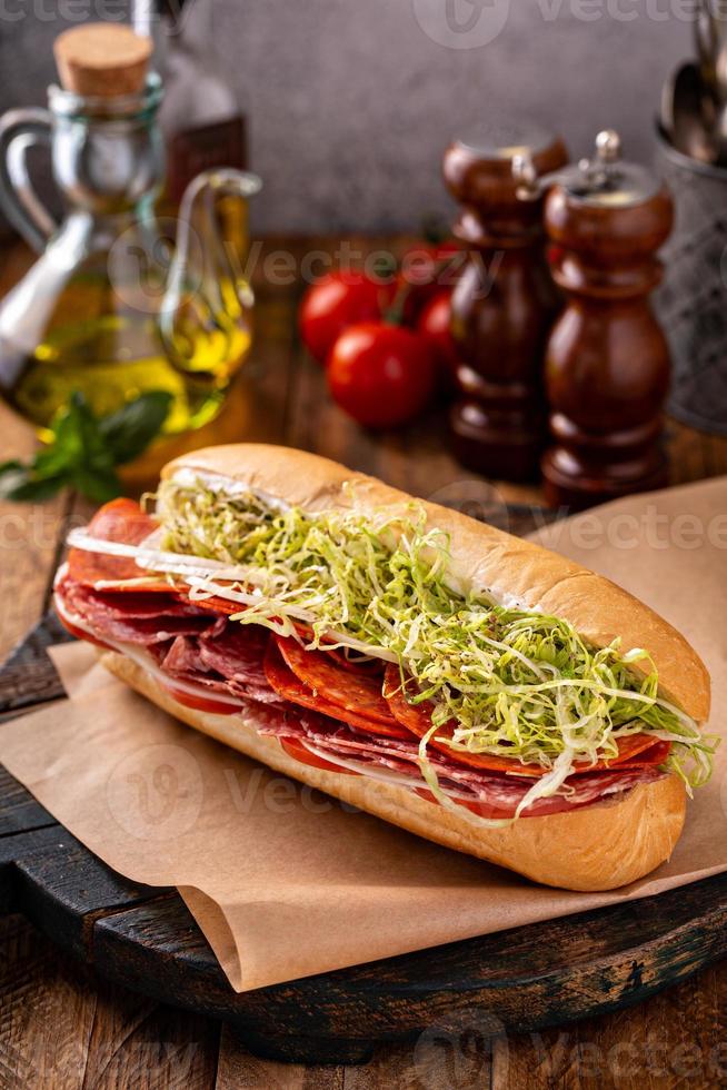 Italian antipasto sandwich with salami and provolone photo