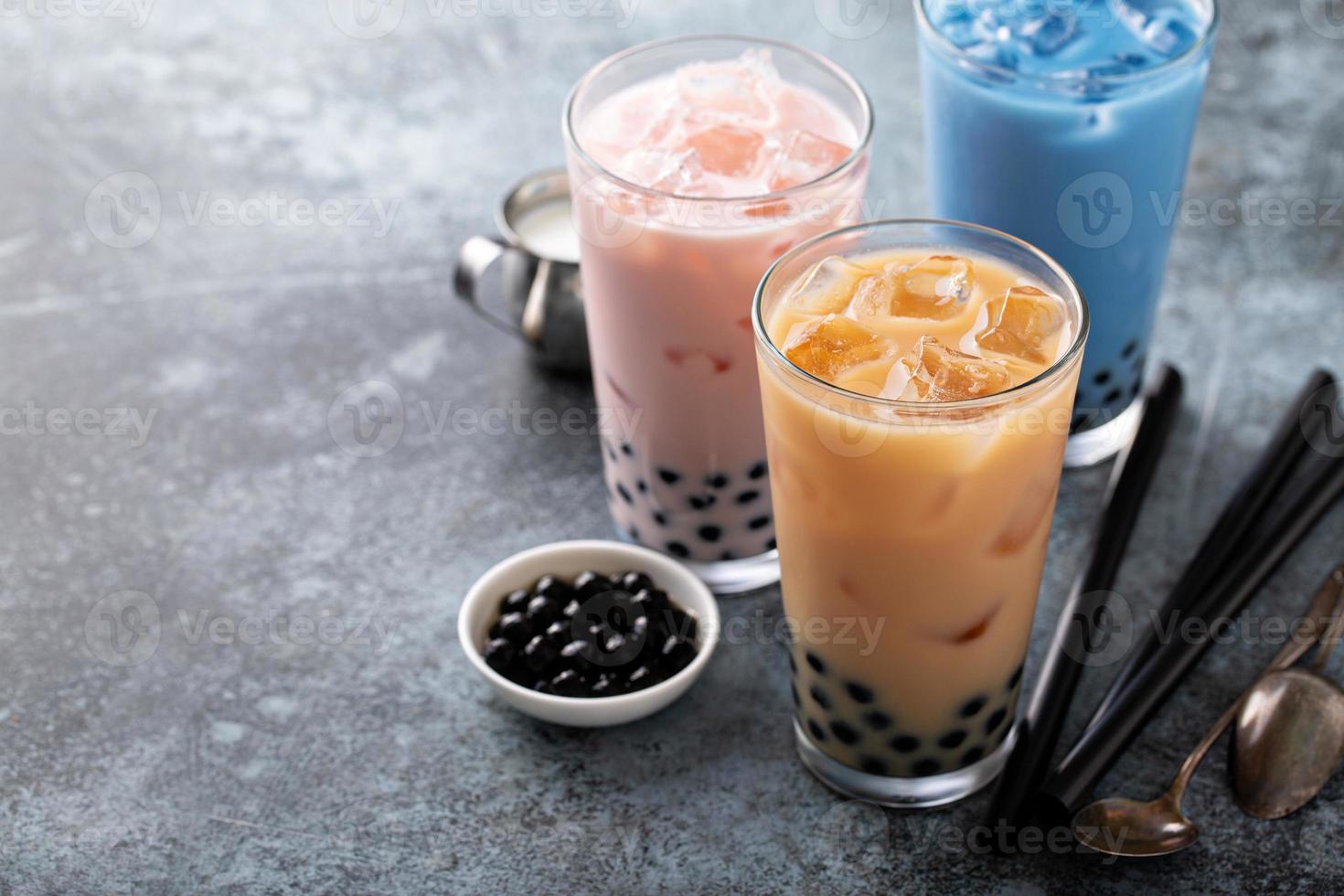 Variety of milk bubble tea in tall glasses photo