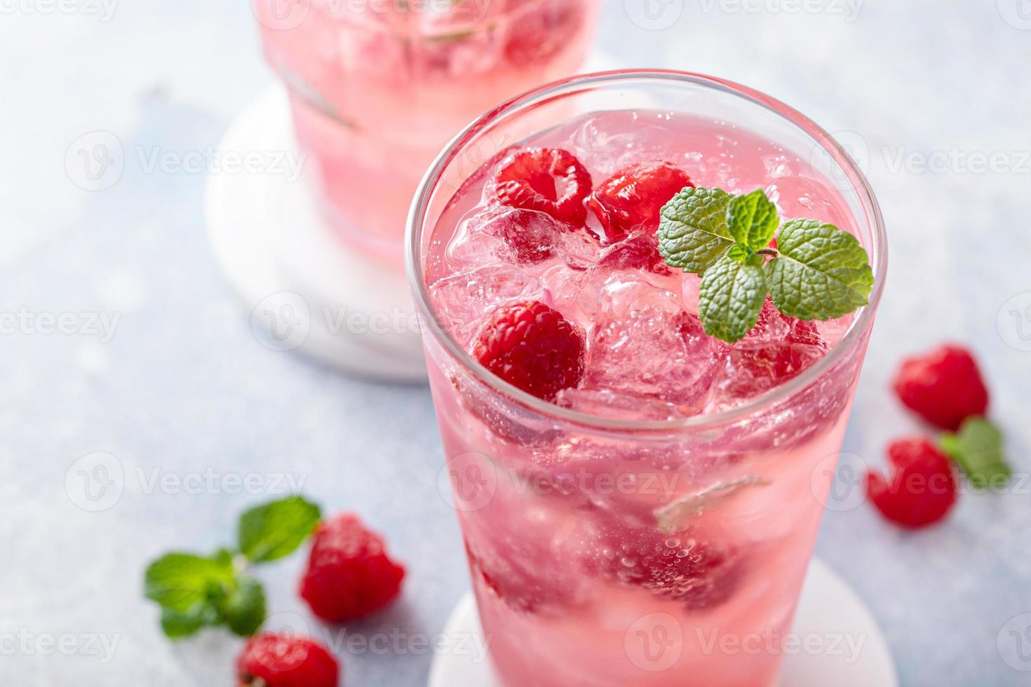Spring or summer cocktail with raspberry and mint photo