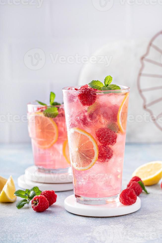 Spring or summer cold cocktail, raspberry lemonade photo