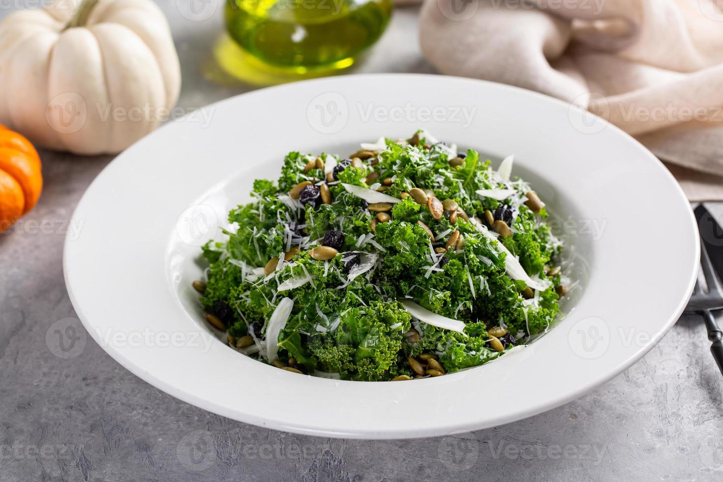 Fall salad with kale, fennel and pumpkin seeds photo
