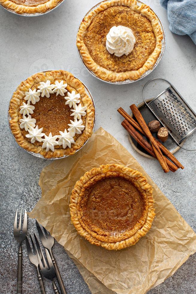 Mini sweet potato pies, warm spicy fall dessert photo