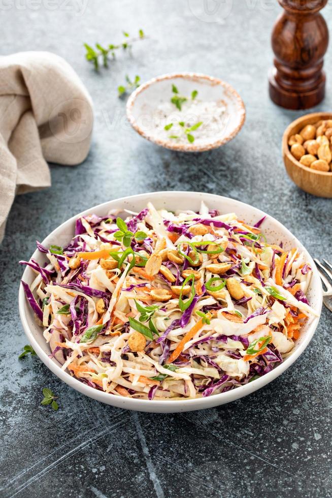 Asian cole slaw with peanuts and green onion photo