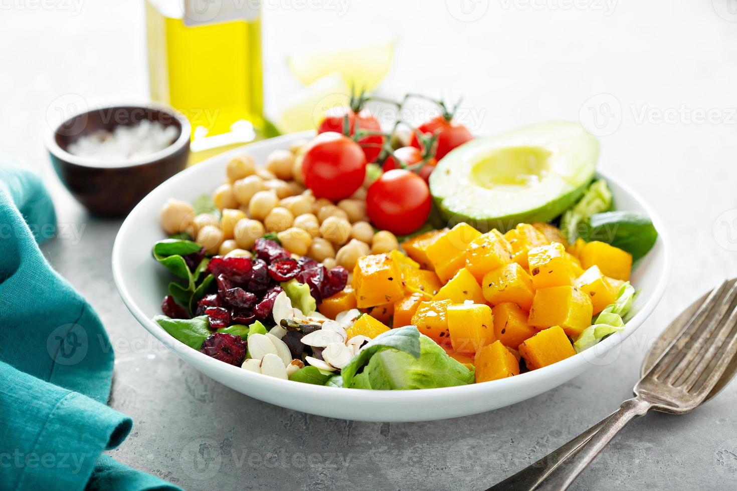 Vegan lunch bowl with chickpeas and roasted squash photo