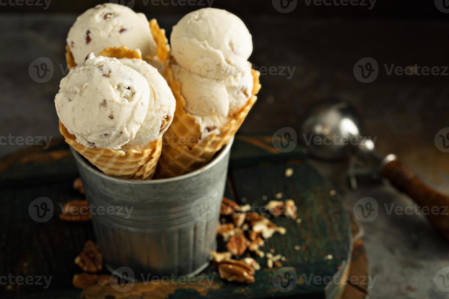 Homemade caramel pecan ice cream cones photo