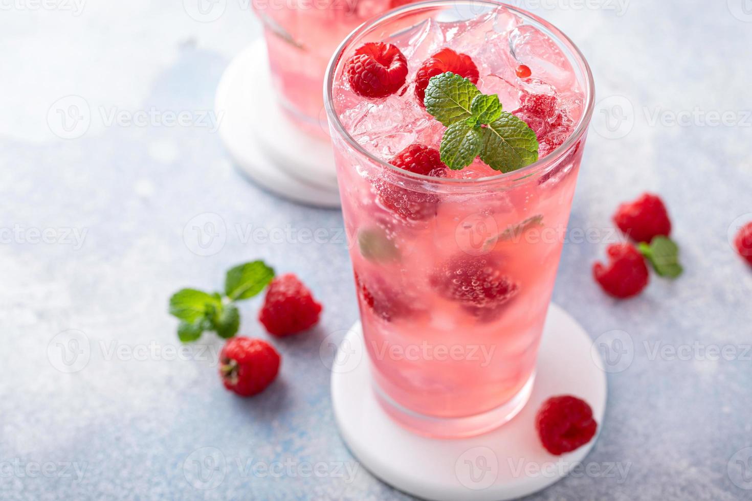 Spring or summer cocktail with raspberry and mint photo