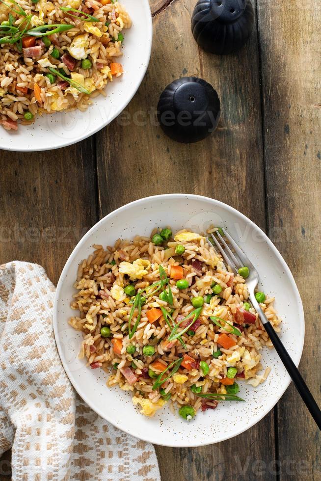 Breakfast fried rice with eggs and bacon photo