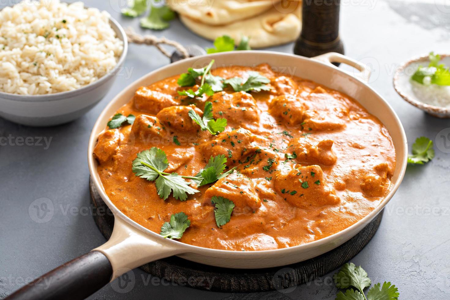 Chicken tikka masala, cooked marinated chicken in spiced curry sauce photo