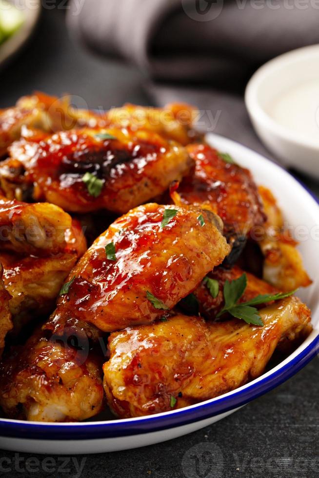 Hot sauce glazed chicken wings, roasted or fried photo