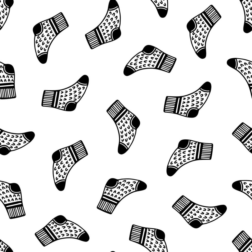 Warm knitted socks. Hand drawn seamless vector pattern.  Simple doodle on white background. Soft woolen footwear. Homemade stockings for winter. Cartoon backdrop for cards, wallpaper, prints