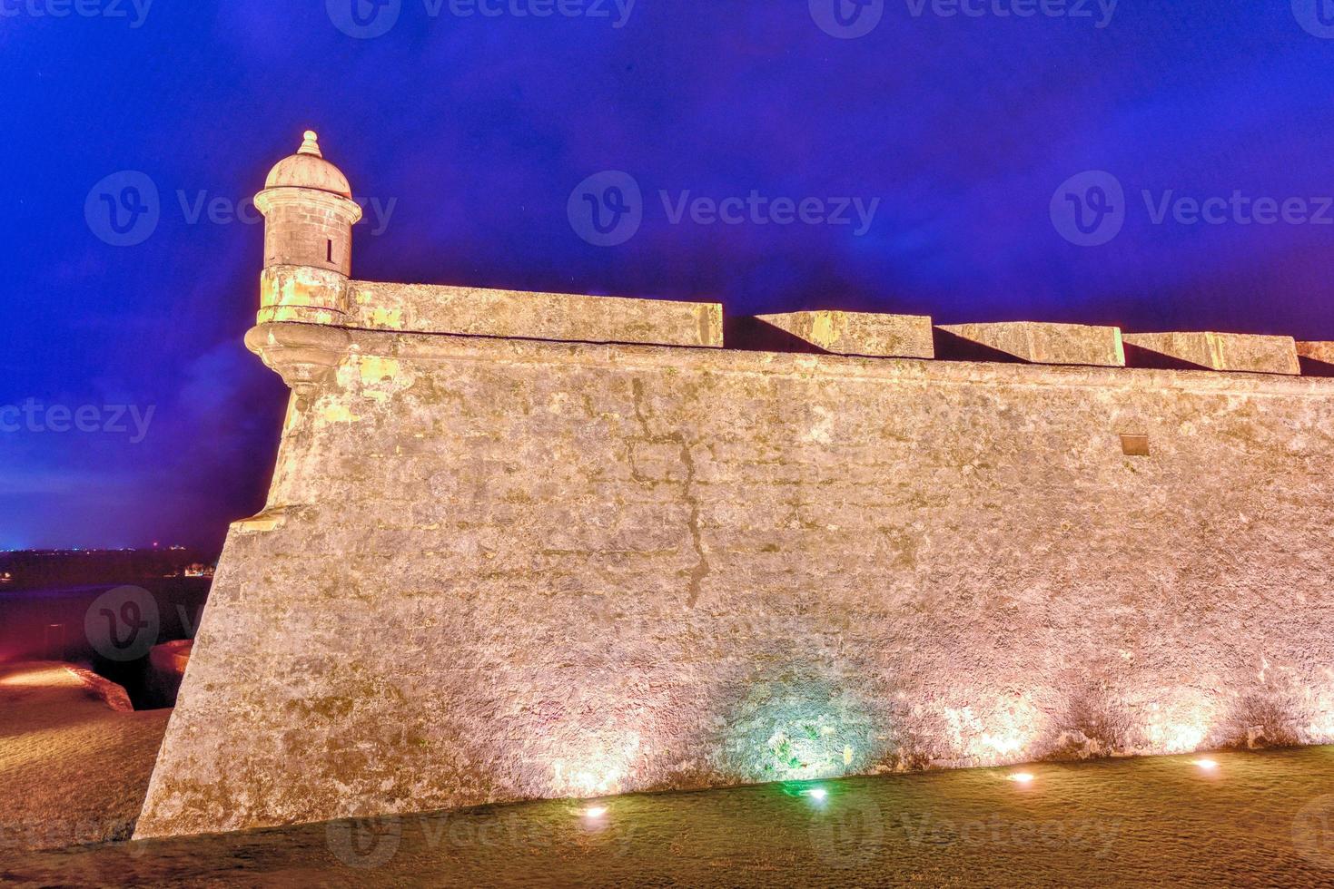 Castillo San Felipe del Morro also known as Fort San Felipe del Morro or Morro Castle at dusk. It is a 16th-century citadel located in San Juan, Puerto Rico. photo