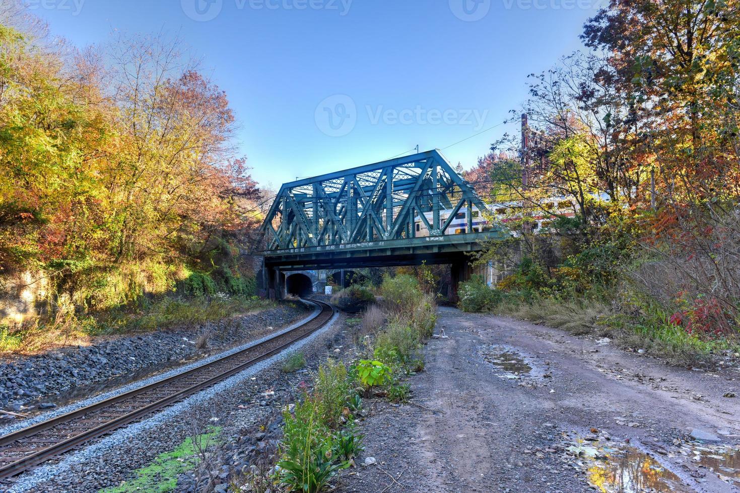 Train passing over bridge in Jersey City, New Jersey. photo