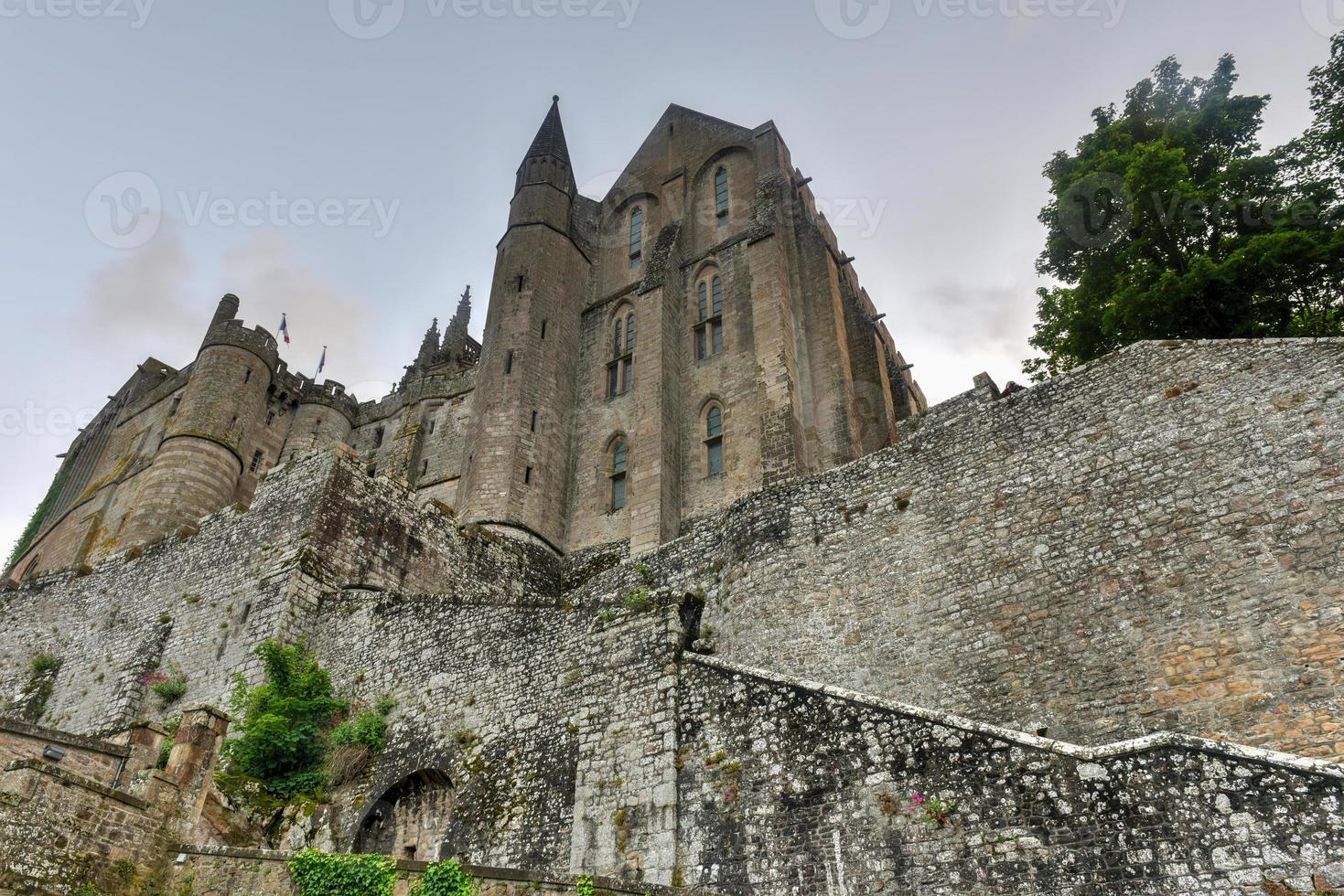 Beautiful Mont Saint-Michel cathedral on the island, Normandy, Northern France, Europe. photo