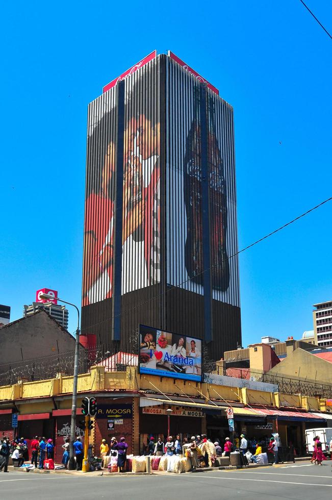 Johannesburg, South Africa - October 22, 2011 -  Central business district of Johannesburg with Coca-cola advertising on building. photo