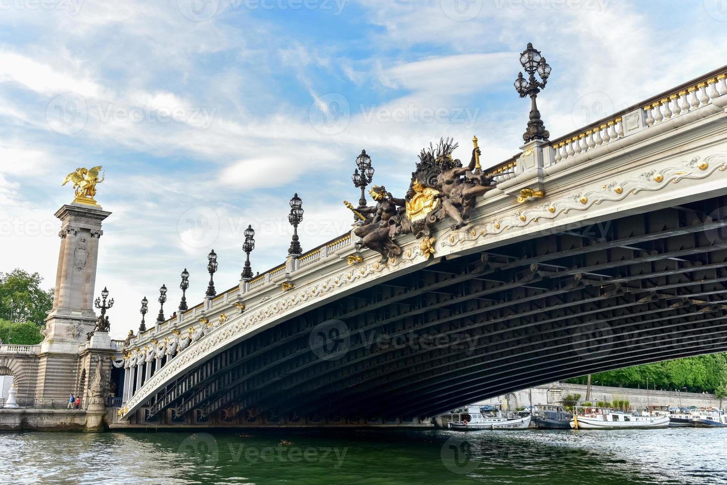 Alexandre III Bridge located in Paris, France. The Pont Alexandre III is a deck arch bridge that spans the Seine in Paris. photo