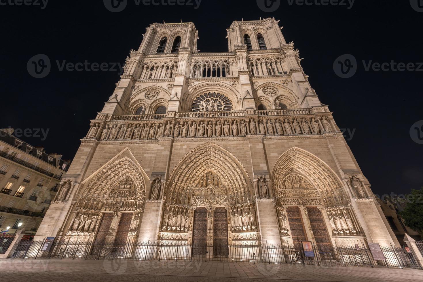 Notre-Dame de Paris, is a French Gothic medieval Catholic cathedral on the Ile de la Cite in the fourth arrondissement of Paris, France. photo