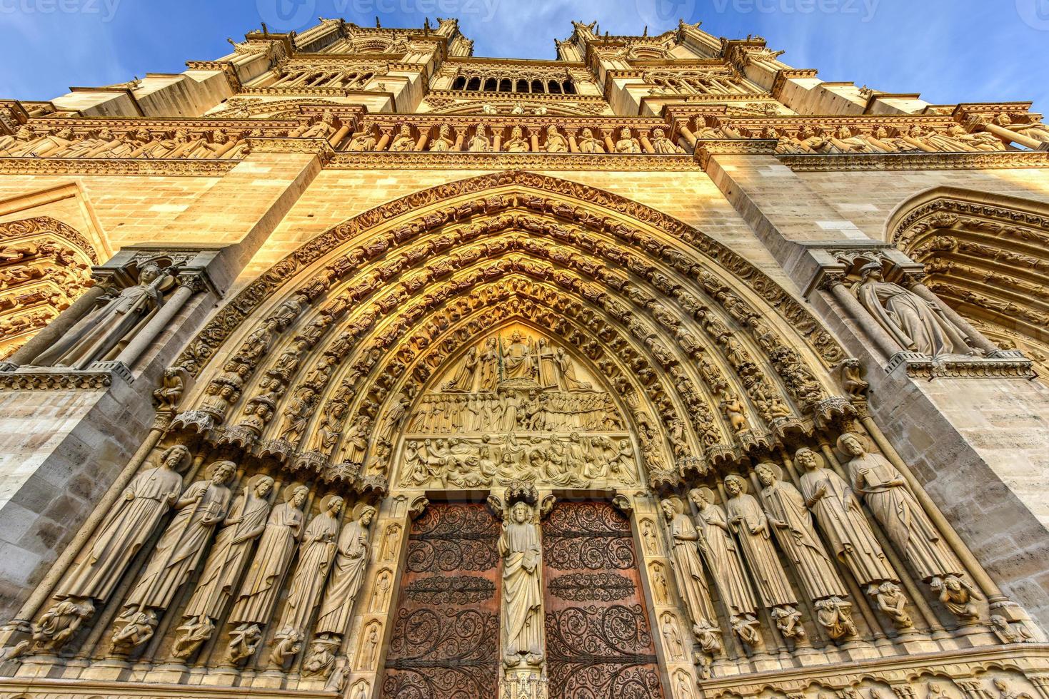 Notre-Dame de Paris, is a French Gothic medieval Catholic cathedral on the Ile de la Cite in the fourth arrondissement of Paris, France. photo