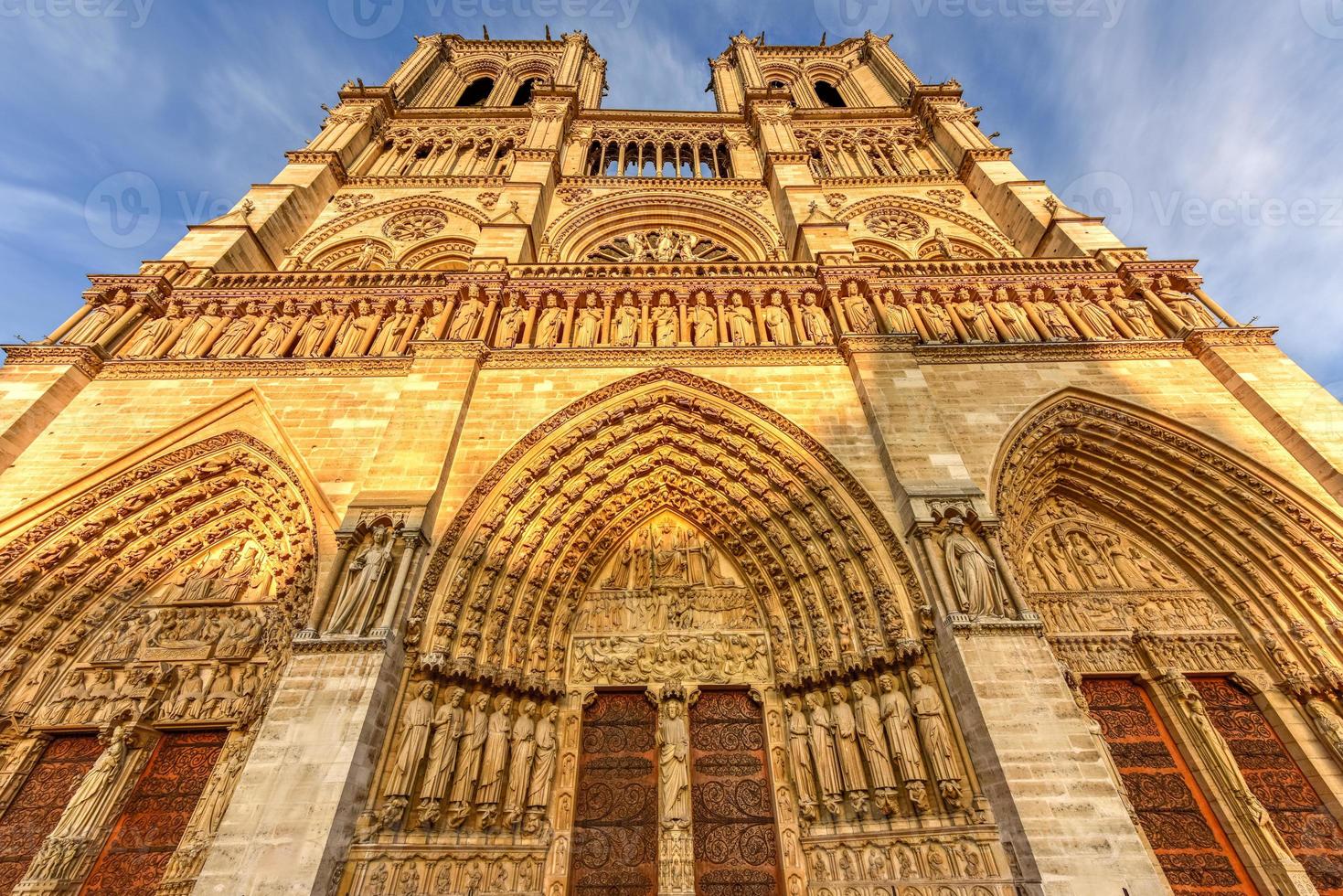 Notre-Dame de Paris, is a French Gothic medieval Catholic cathedral on the Ile de la Cite in the fourth arrondissement of Paris, France. photo